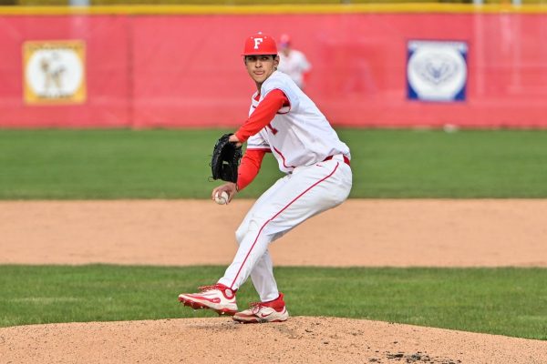 Senior Miles Tebben throws a pitch on Apr. 16, 2025, against Noblesville at Fishers High School. The Tigers lost 6-5. Photo courtesy of Jenni Jenkins.