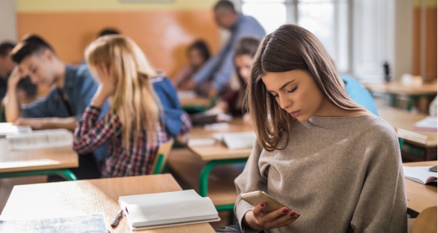 This is a common example of the effect of phones at school. Photo courtesy of Creative Commons. 